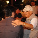 photo of Louie Perez Sr. with his hand on Raul Perez' back